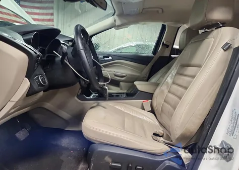 2017 Ford Escape Titanium z USA, uszkodzony, nr VIN 1FMCU0J9XHUE18306